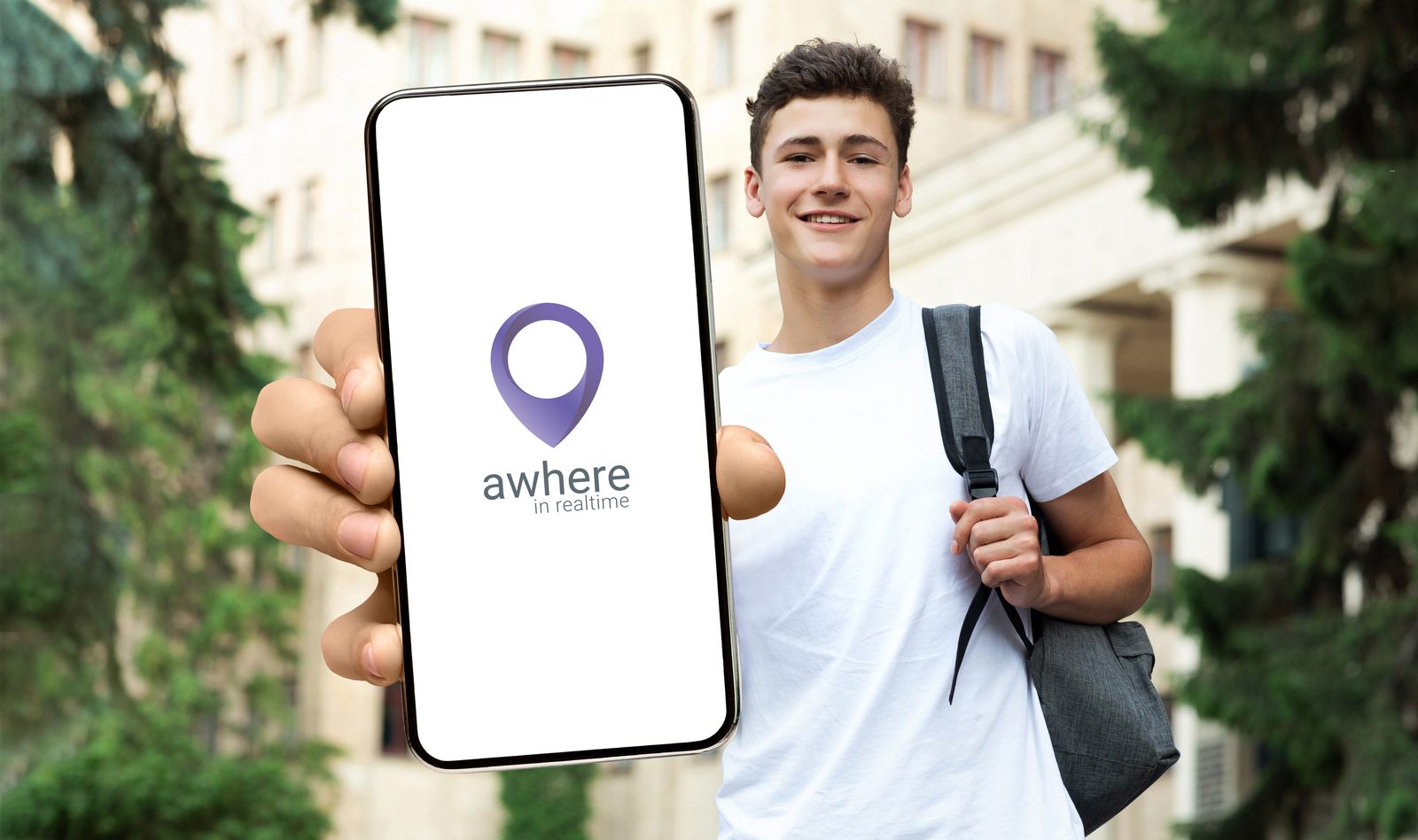 Student holding up a phone showing the Awhere app